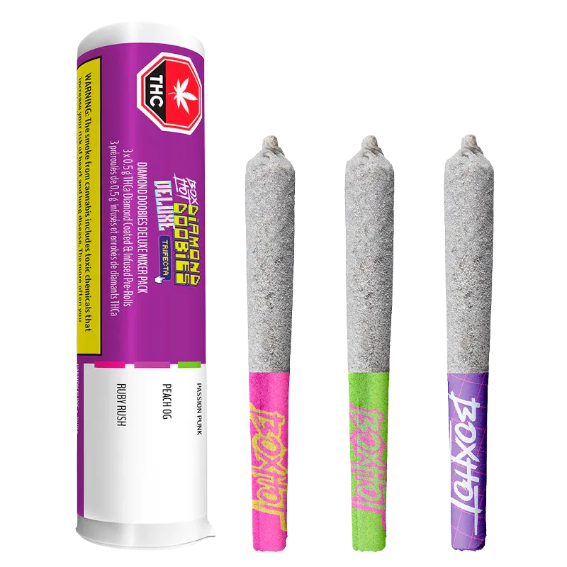 Three quarter view of a tube and three ash-coated pre-rolls arranged upright, labeled "Diamond Doobies Deluxe Trifecta Infused PR 3 x 0.5 g" on the purple tube.
