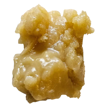 Close-up of a golden, chunky wax nugget of Gilded Live Rosin against a white background.
