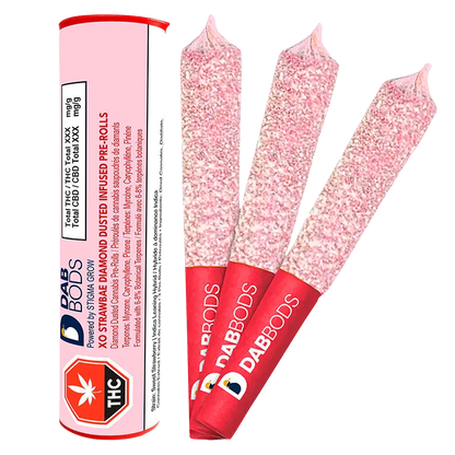 Three diamond-dusted pink pre-rolls fanned beside their pink tube packaging labeled XO Strawbae Diamond Dusted Infused PR 3 x 0.6 g