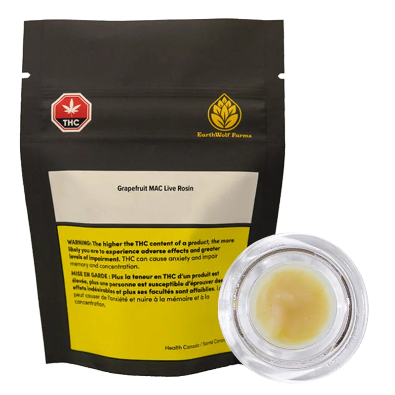 Front-facing shot of a black pouch and clear jar of Grapefruit Mac Live Rosin by EarthWolf Farms, the pouch showing warning labels and a gold logo.