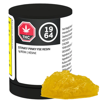 Close-up of a glossy yellow resin mound in front of a black jar labeled Stinky Pinky FSE Resin.