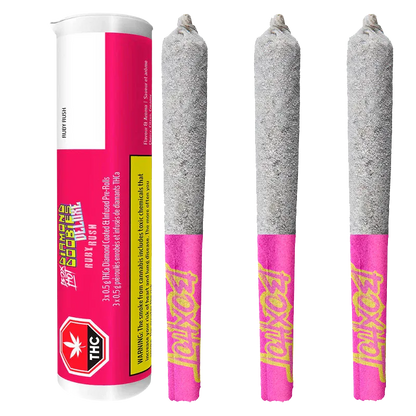 Three-quarter view of a tube and three ash-coated joints with pink branded tips reading "Diamond Doobies Deluxe Ruby Rush Infused PR 3 x 0.5 g."