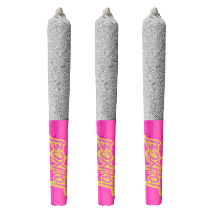 Three upright pre-rolls photographed front-on against a white background, labeled "Diamond Doobies Deluxe Ruby Rush Infused PR 3 x 0.5 g" with bright pink tips.