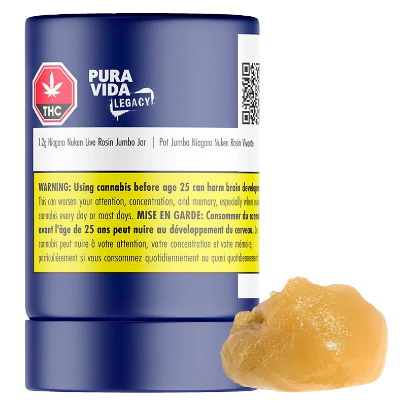 Front-facing view of a blue jar labeled "Niagara Nuken Jumbo Jar Rosin" by Pura Vida Legacy with a yellow warning band and a dollop of amber rosin beside it