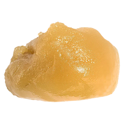 Close-up of a glossy golden dab of Niagara Nuken Jumbo Jar Rosin displayed on a white background, showing its smooth, slightly textured surface.