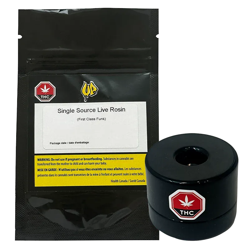 Front-facing shot of the Single Source Live Rosin black resealable pouch with label visible, shown next to a glossy black round container.