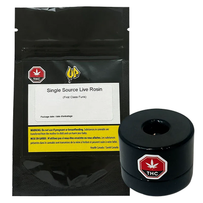 Front-facing shot of the Single Source Live Rosin black resealable pouch with label visible, shown next to a glossy black round container.