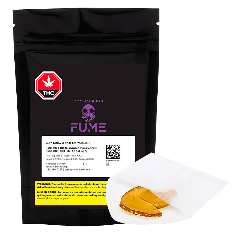 Front-facing shot of a black pouch and a piece of amber concentrate on white parchment, showing the "Exhaust Haze Shatter" FUME packaging.
