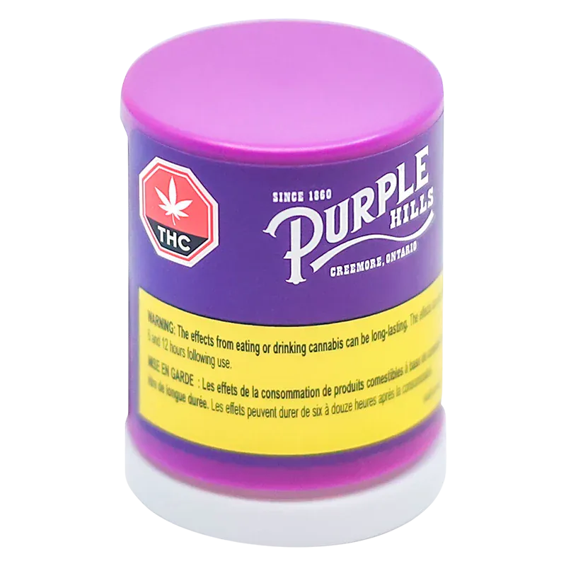 Three-quarter view of the purple and pink Tropical Twist Live Resin Badder container with a yellow warning band and THC symbol.