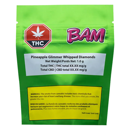 Front view of the bright green BAM Pineapple Glimmer Whipped Diamonds package with a red THC symbol and white product label.