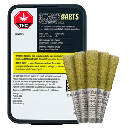 Front-facing shot of a black tin with five gold-coated pre-rolls leaning against it, labeled "Moon Drops Bubble Hash Coated Infused PR 5 x 0.5 g".