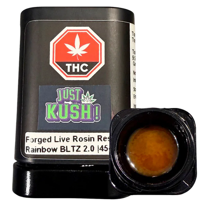 Close-up front view of a black jar and open pot of amber concentrate labeled Live Rosin Reserve, the "Just Kush!" sticker and THC octagon visible.