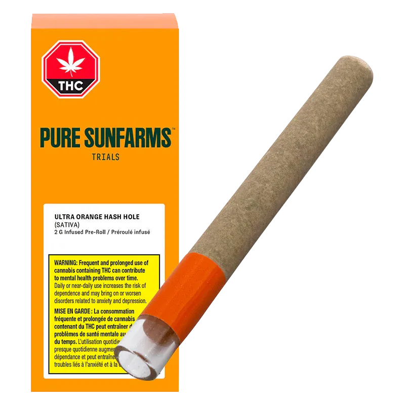 Angled view of an Ultra Orange Hash Hole Infused PR 1 x 2 g pre-roll resting beside bright orange Pure Sunfarms packaging, showing the paper tube and orange tip.