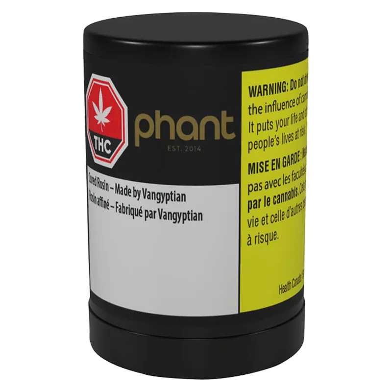 Front-facing view of the black jar labeled "Cured Rosin - Made By Vangyptian" with a gold "phant" logo and a bright yellow warning panel.