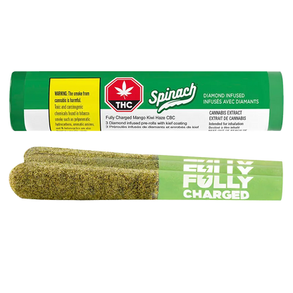 Side view of a green Spinach tube and three kief-coated pre-rolls for Fully Charged Mango Kiwi Haze CBC Infused PR 3 x 0.5 g.