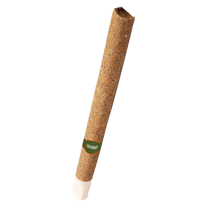 Diagonal close-up of a cork-colored Smoky Apple Iced HashWoods Hash Infused PR 1 x 1 g blunt with a green "Saturday" band near the filter.