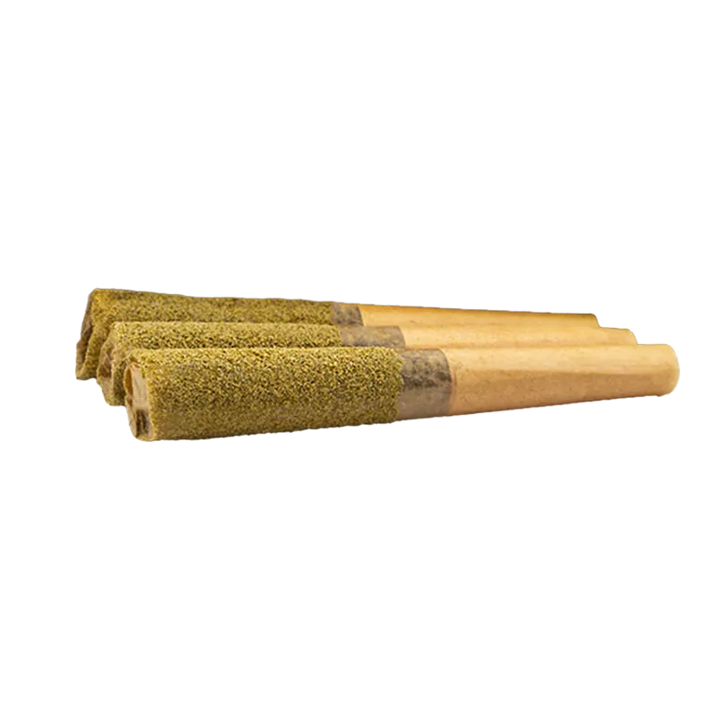 Close-up, low-angle view of three Raspberry Lemonade Diamond Infused PR 3 x 0.5 g pre-rolls lined up with greenish diamond coating on their tips.