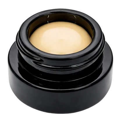 Top-down view of a glossy black jar filled with pale yellow concentrate labeled Sherbert Live Rosin.