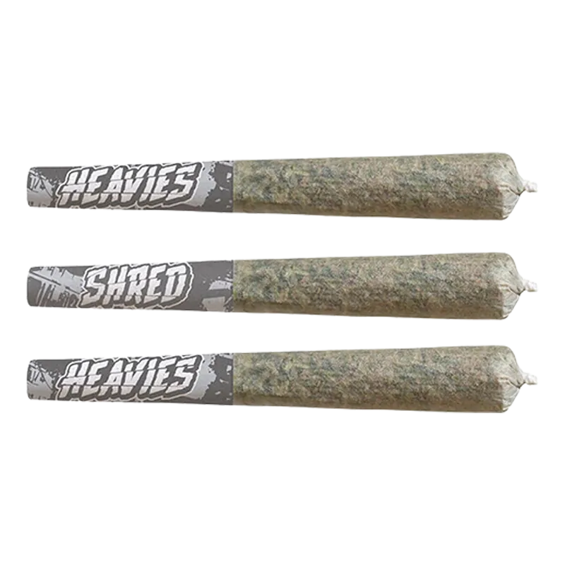 Three horizontal pre-rolled joints with gray "Heavies" paper tips shown in a flat lay of the Shark Attack Heavies Infused PR 3 x 0.5 g.