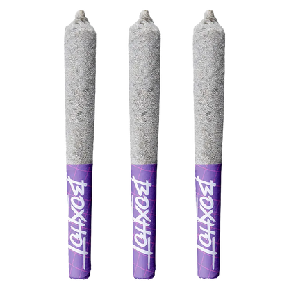 Three upright cone-shaped pre-rolls photographed front-on against white, labeled "Grape Smuggler Infused PR 3 x 0.5 g" with purple branded tips.
