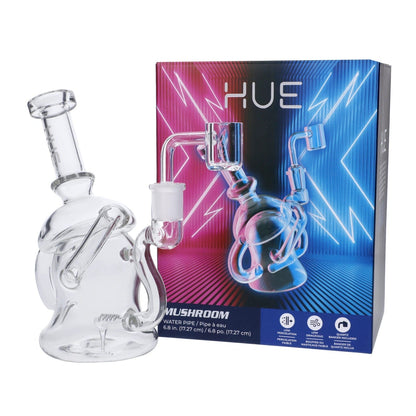 Front view of the Hue Mushroom Dab Rig Clear, showcasing its 6.8-inch height and clear glass construction against a gradient blue backdrop.