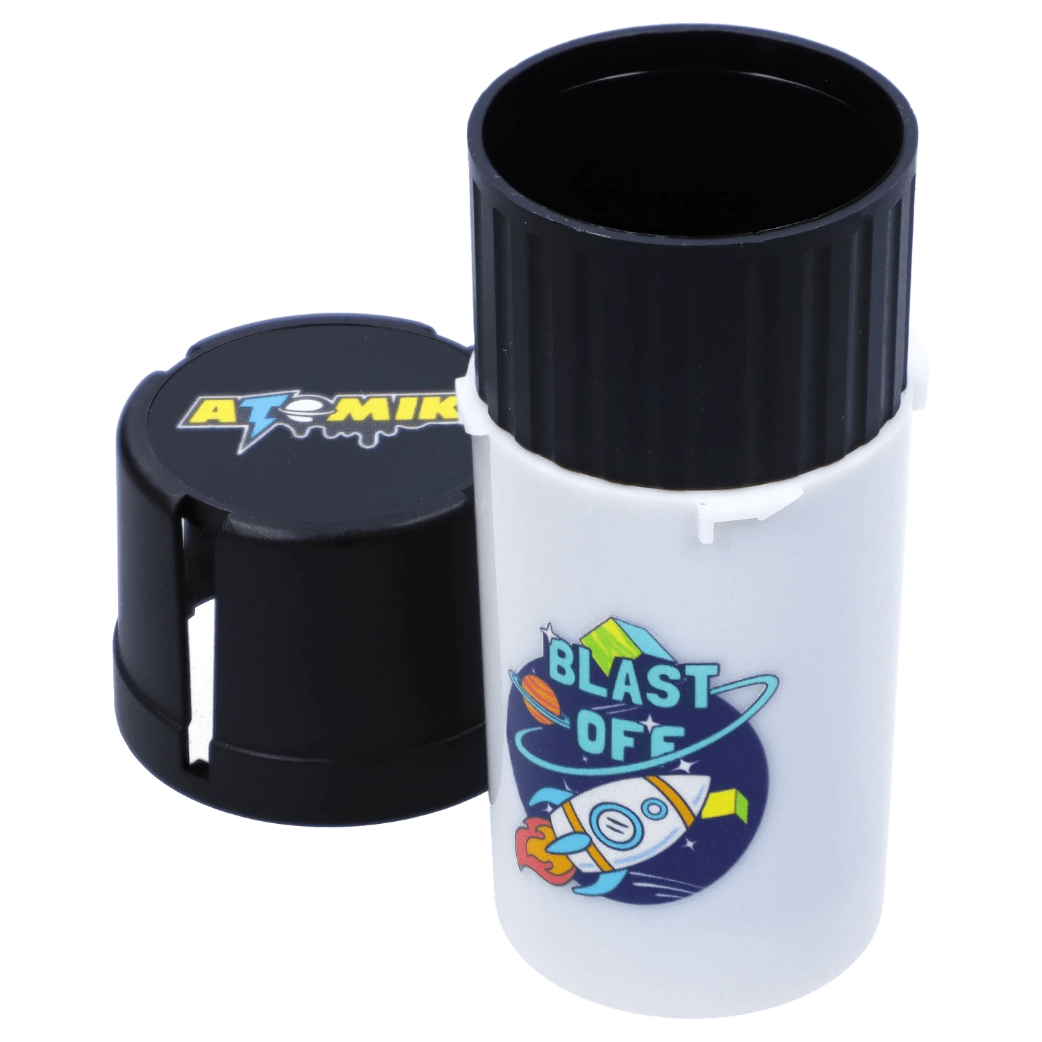 Close-up three-quarter view of the Atomik Grind & Stash showing a white cylindrical body with a rocket "Blast Off" sticker and a removed black grooved cap revealing the hollow interior.