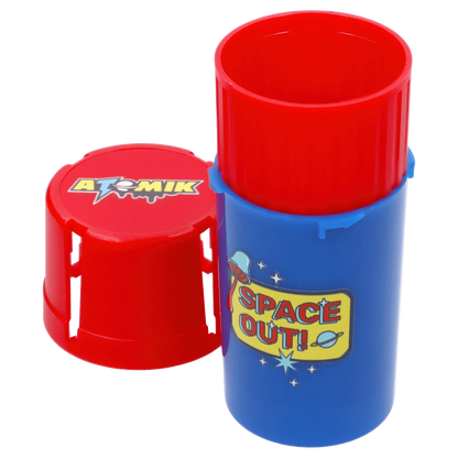Close-up front view of a blue and red capsule with the Atomik Grind & Stash logo visible on the red cap.