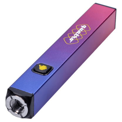 Angled close-up of a purple-to-pink metallic HoneyStick Quatro Variable Voltage Vape Multi showing its square body, top threading, and single black control button.