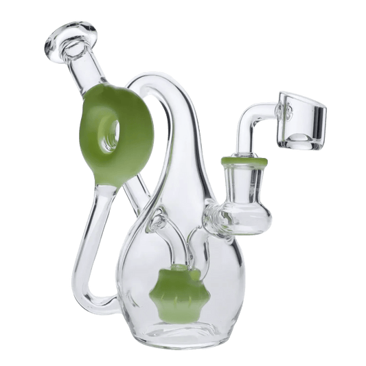 A close-up, angled view of the Mini-Milky Green-7 in water pipe, highlighting its green accent and clear glass construction.
