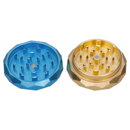 Top-down view of the opened Famous Design Floral Lush Aluminum 2 Stage Grinder - Teal and Gold showing its teal left half and gold right half with faceted outer edges and staggered teeth.