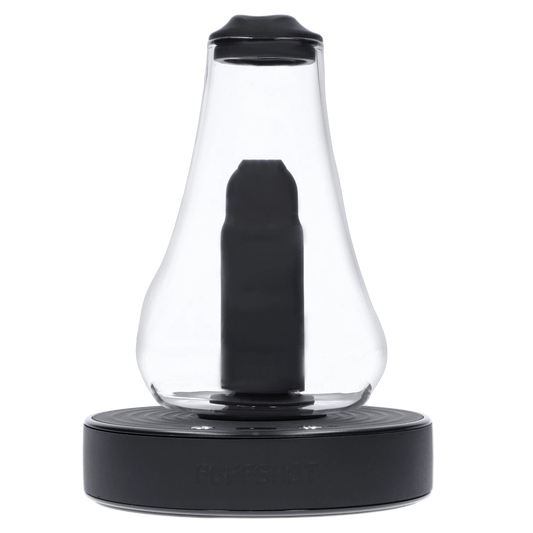 Front view of the black Puffshot Sippable Glass, showcasing its sleek, rounded shape and minimalist design.