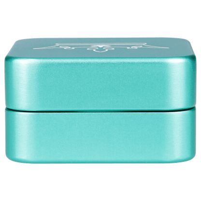 Front view of the Queen of Bud 2 Stage Grinder Aventurine, a two-tiered metal grinder with a smooth, polished finish.