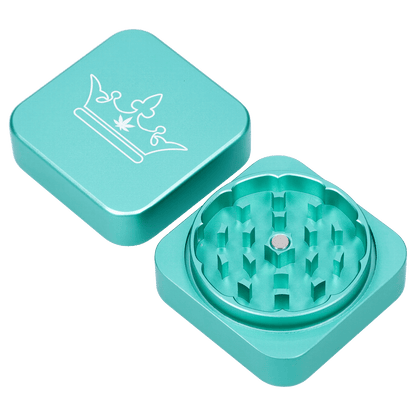 Close-up, top-down view of the Queen of Bud 2 Stage Grinder Aventurine, showing the multi-tiered grinding teeth inside the metallic container.