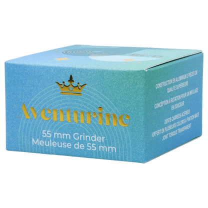 A close-up of the two-stage Queen of Bud Aventurine grinder, showing its metallic finish and circular design.