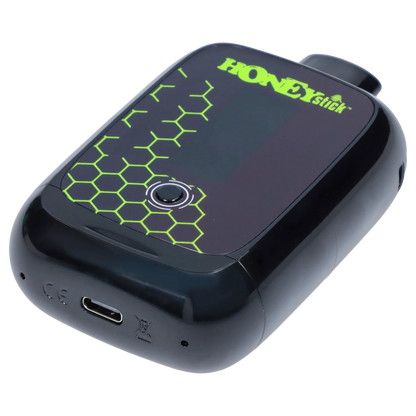 Close-up of the Honeystick Duo Variable Voltage Plus, showing a sleek, black device with a textured grip and a charging port.