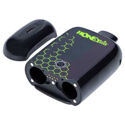 A close-up, angled view of the Honeystick Duo Variable Voltage Plus with a sleek, dark finish and rounded design.