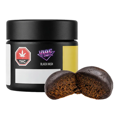 Front-facing jar labeled Vibe Black Hash with a halved dark brown, crumbly ball placed in front on a white background
