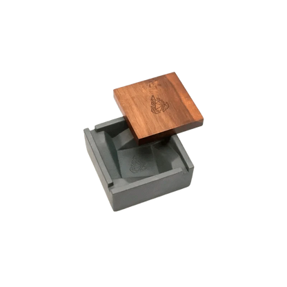 A top-down view of the BRN Briq Concrete Ashtray (Marble), showcasing its square shape and textured, stone-like surface.