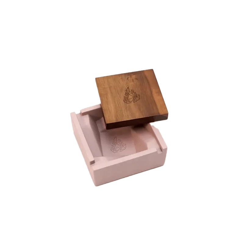 A top-down view of the BRN Briq Concrete Ashtray (Marble) with a minimalist design and textured surface.