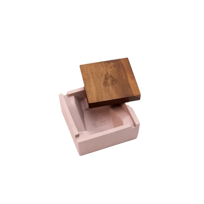 A top-down view of the BRN Briq Concrete Ashtray (Marble) with a minimalist design and textured surface.
