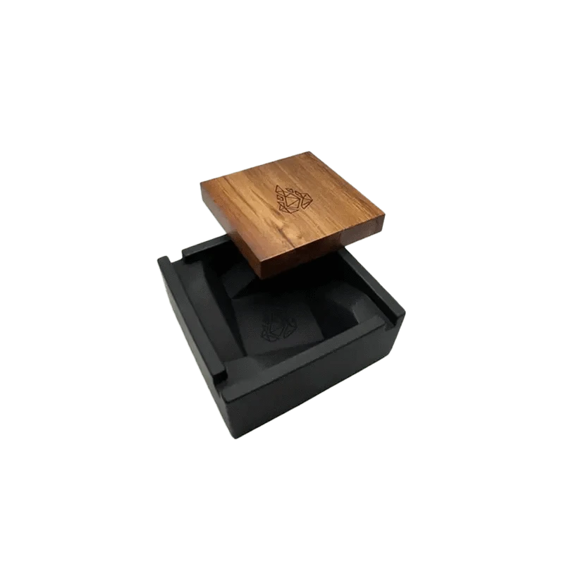 A top-down view of the BRN Briq Concrete Ashtray (Marble) with a simple, modern design and a dark interior.