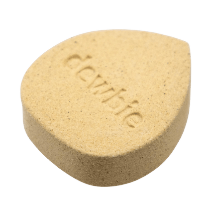 A close-up of the Devil's Lettuce Dewbie Rehydrating Stone, showcasing its rounded shape against a white backdrop.