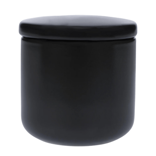 A front view of the small, black Famous Design Ceramic Stash Jar w /Lid, showing its simple, cylindrical form and sealed lid.