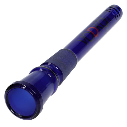A slightly angled view of the 120mm blue Vodka Downstem - 18-18, displaying its clear glass construction.