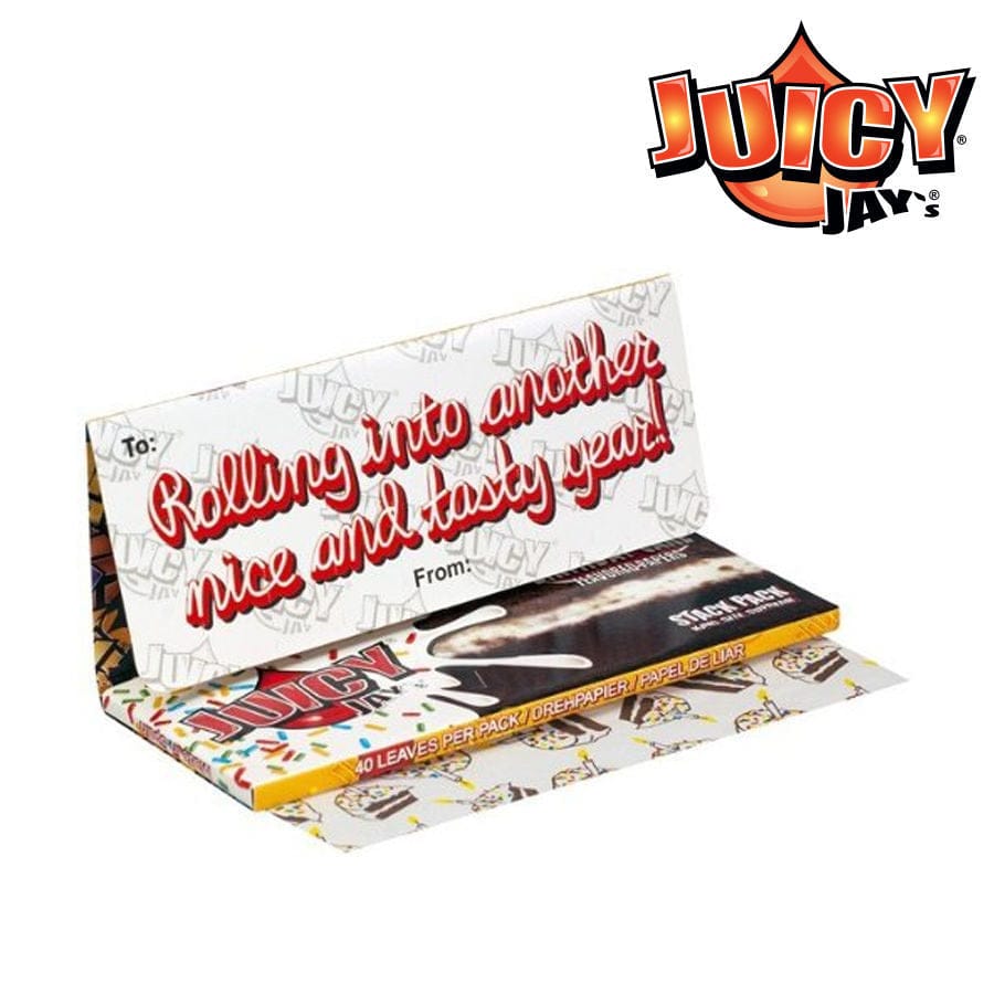 A close-up of the packaging for Juicy Jay's Rolling Papers + tips - Birthday Cake, showcasing colorful, festive designs.