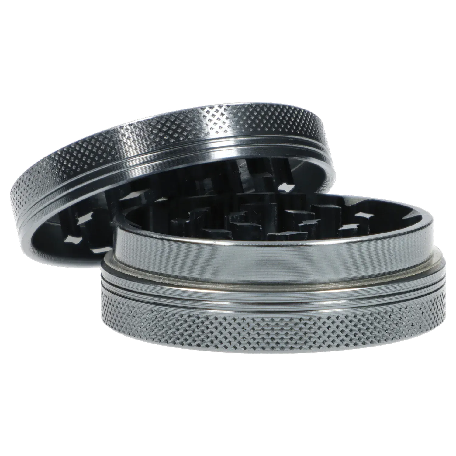 Close-up angled view of the Famous X Chrome 2 pc Grinder - Gray-55mm showing its textured outer rim and exposed interlocking teeth.