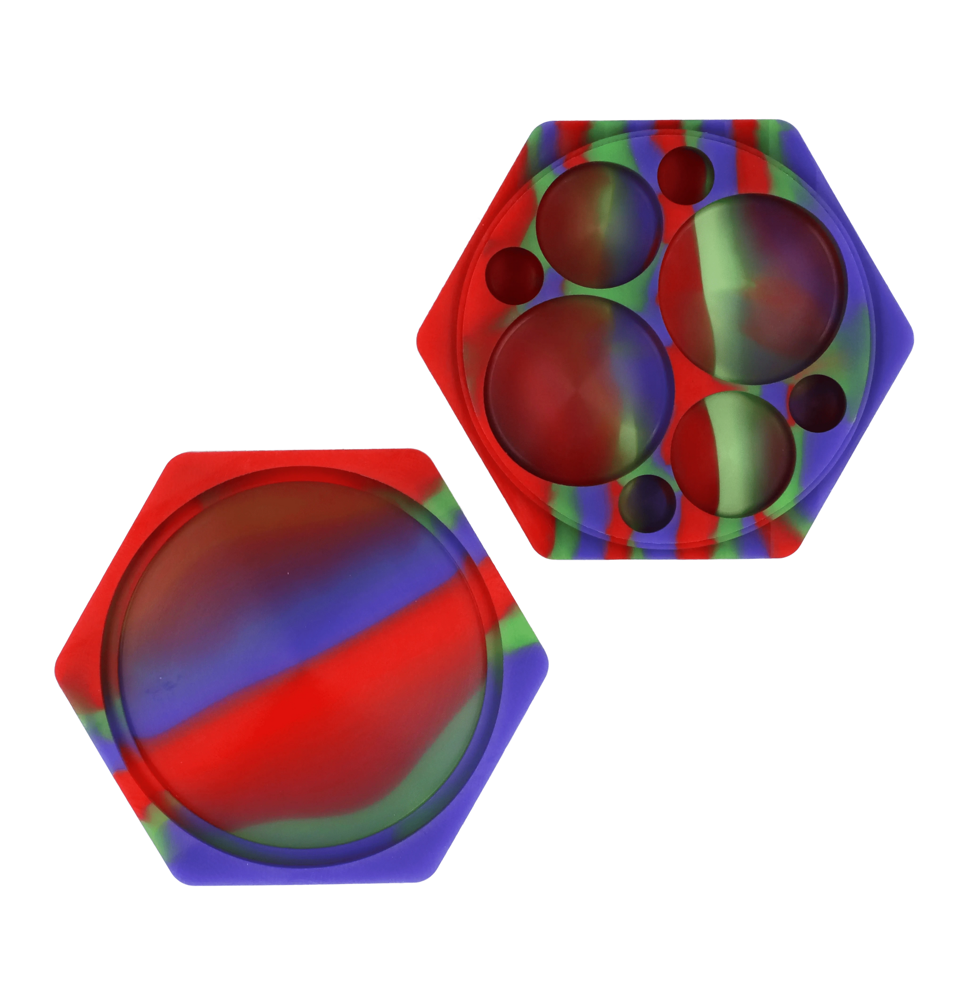 Angled close-up of a red, green and blue hexagonal Valiant Silicone Hexagon 8 compartment Container - 110 ml showing circular indentations against a black background
