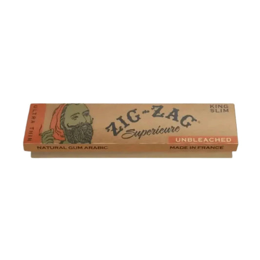 A close-up of the OCB Virgin Unbleached Rolling Papers booklet, showing its simple, tan-colored packaging.