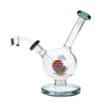 A three-quarter view of the 7-inch Cabana Cannabis Co. Surf Water Pipe in teal, showcasing its curved form and smooth glass finish.