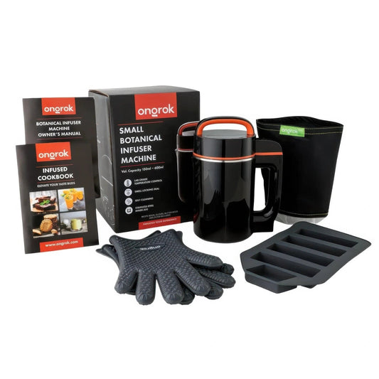 Front view of the black Ongrok Botanical Infuser Machine, showcasing its packaging and a cookbook alongside the small device.